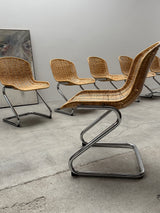 SET OF 6 GASTONE RINALDI RATTAN CANE CANTILEVER DINING CHAIRS WITH CHROMED TUBULAR STEEL FRAME, ITALY 1960s