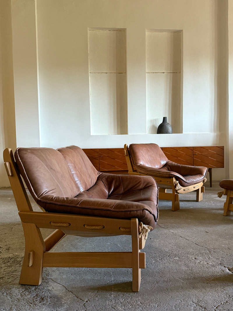 MAISON REGAIN ARMCHAIR, 2-SEATER & OTTOMAN SET LEATHER OAK WOOD, FRANCE 1960s