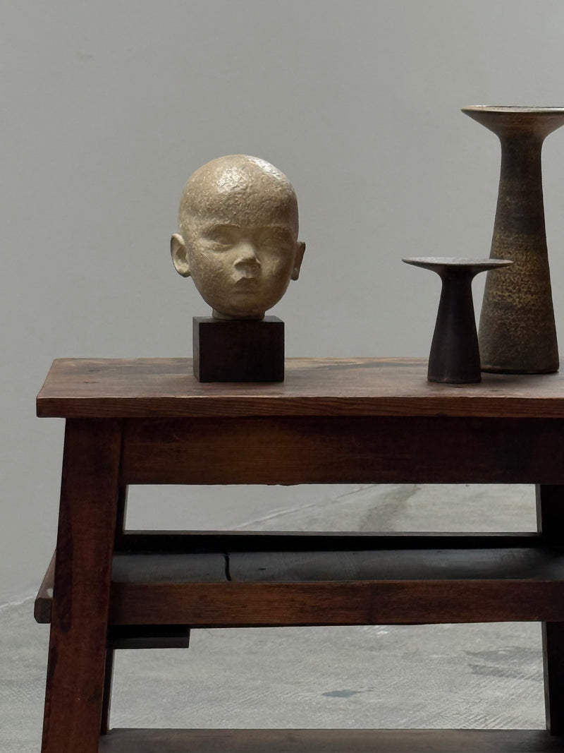 HEAD STATUE PLASTER ON WOODEN BASE PATINATED, GERMANY 1930s