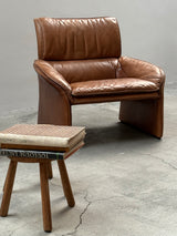 COGNAC LEATHER SEATING GROUP ARMCHAIR SOFA OTTOMAN IM THE STYLE OF DE SEDE, 1980s