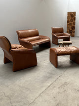 COGNAC LEATHER SEATING GROUP ARMCHAIR SOFA OTTOMAN IM THE STYLE OF DE SEDE, 1980s