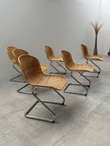 SET OF 6 GASTONE RINALDI RATTAN CANE CANTILEVER DINING CHAIRS WITH CHROMED TUBULAR STEEL FRAME, ITALY 1960s