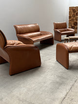 COGNAC LEATHER SEATING GROUP ARMCHAIR SOFA OTTOMAN IM THE STYLE OF DE SEDE, 1980s