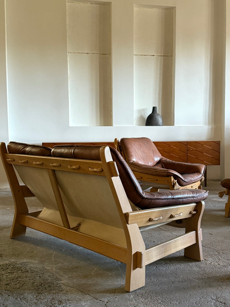 MAISON REGAIN ARMCHAIR, 2-SEATER & OTTOMAN SET LEATHER OAK WOOD, FRANCE 1960s