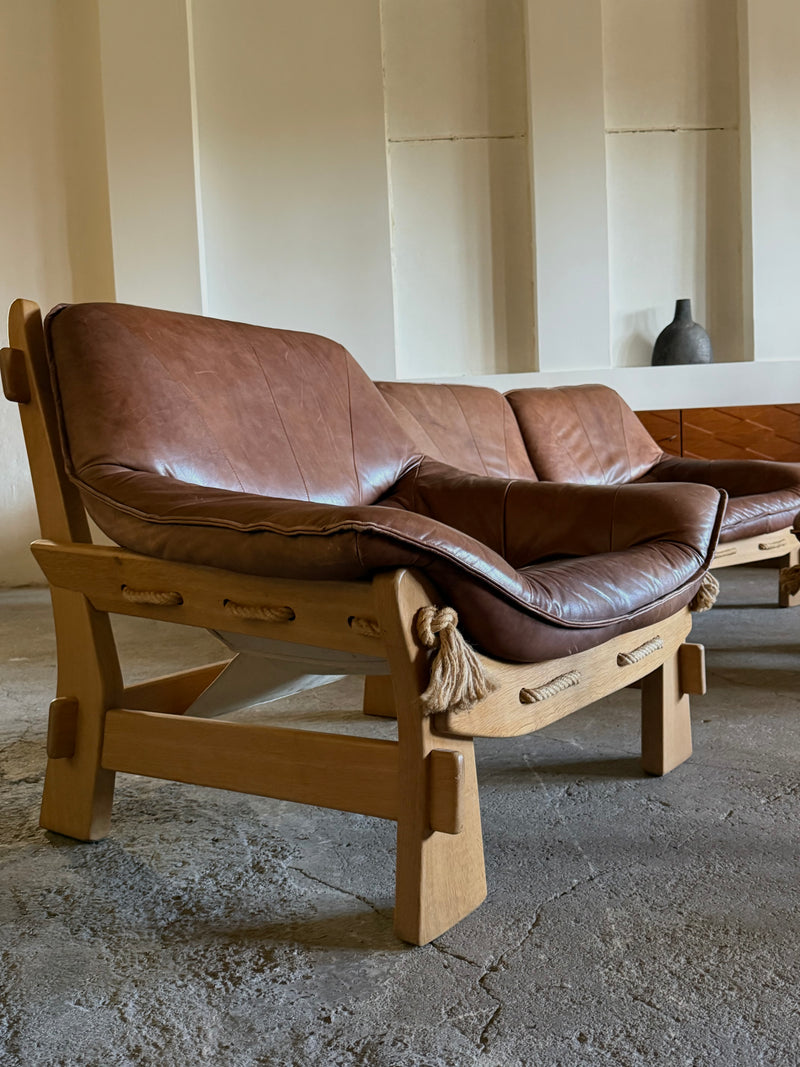MAISON REGAIN ARMCHAIR, 2-SEATER & OTTOMAN SET LEATHER OAK WOOD, FRANCE 1960s