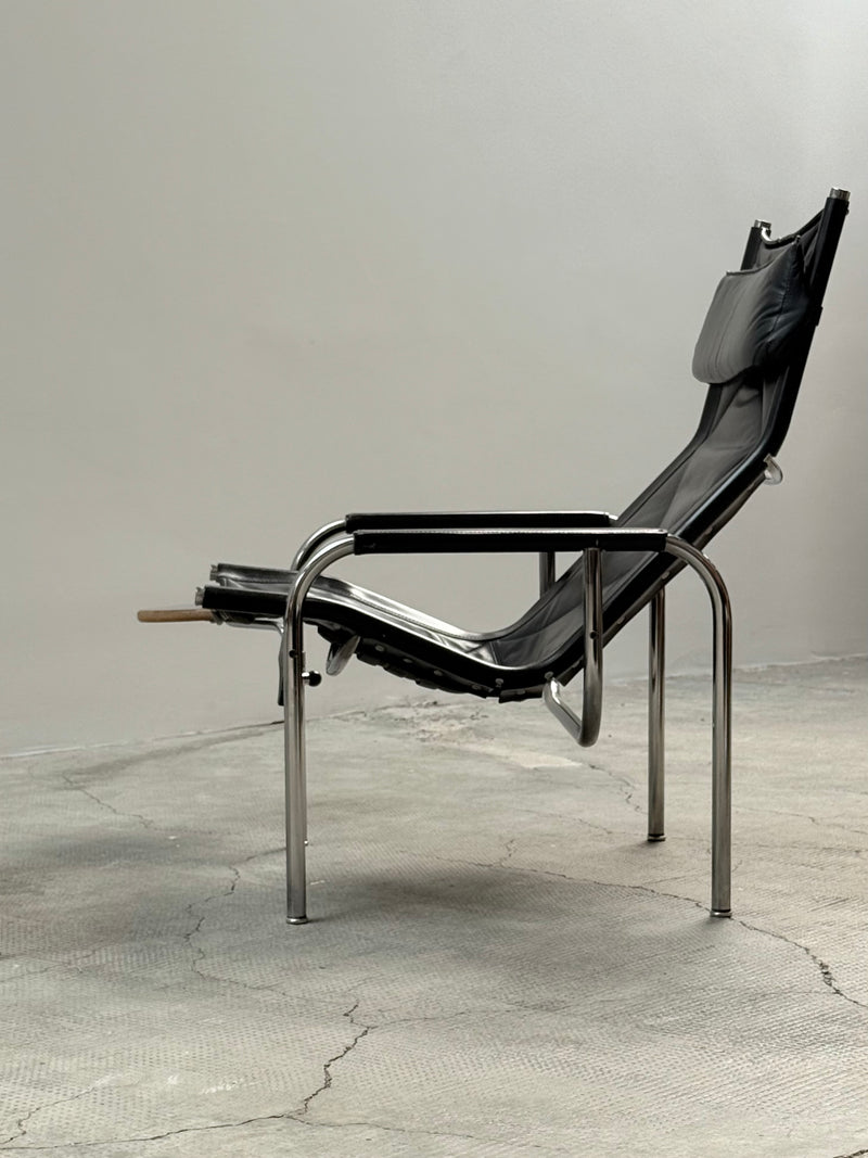 HANS EICHENBERGER FOR STRÄSSLE LOUNGE ARMCHAIR WITH STOOL LEATHER TUBULAR STEEL, SWITZERLAND 1970s