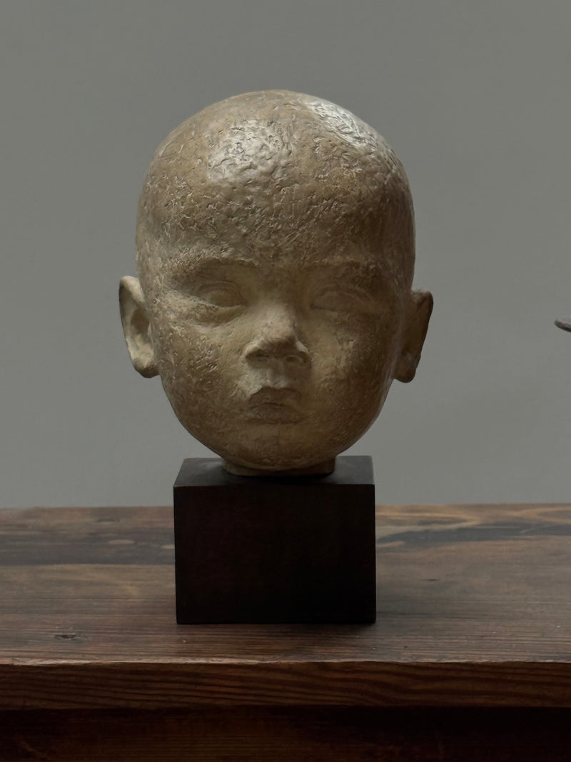 HEAD STATUE PLASTER ON WOODEN BASE PATINATED, GERMANY 1930s