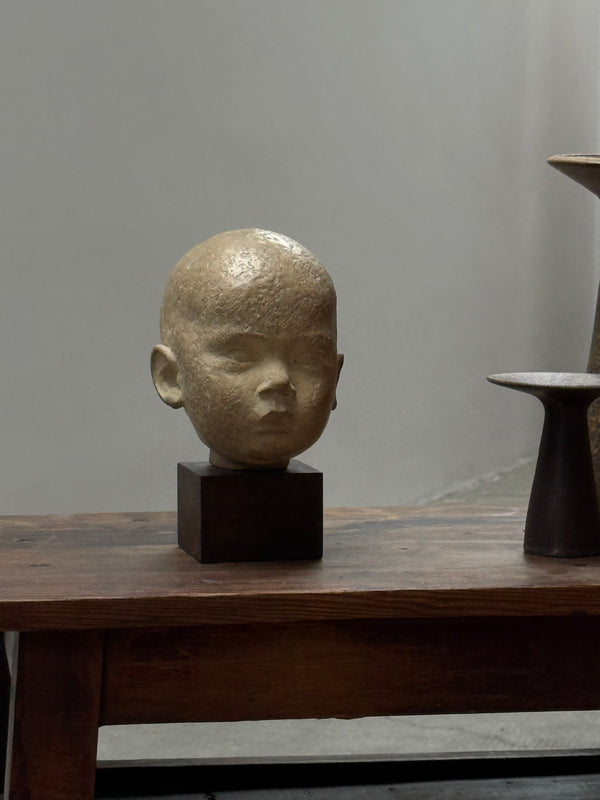 HEAD STATUE PLASTER ON WOODEN BASE PATINATED, GERMANY 1930s