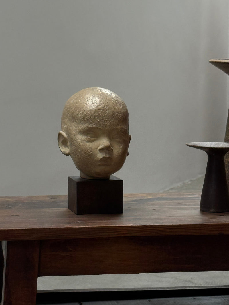 HEAD STATUE PLASTER ON WOODEN BASE PATINATED, GERMANY 1930s