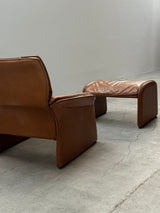 COGNAC LEATHER SEATING GROUP ARMCHAIR SOFA OTTOMAN IM THE STYLE OF DE SEDE, 1980s