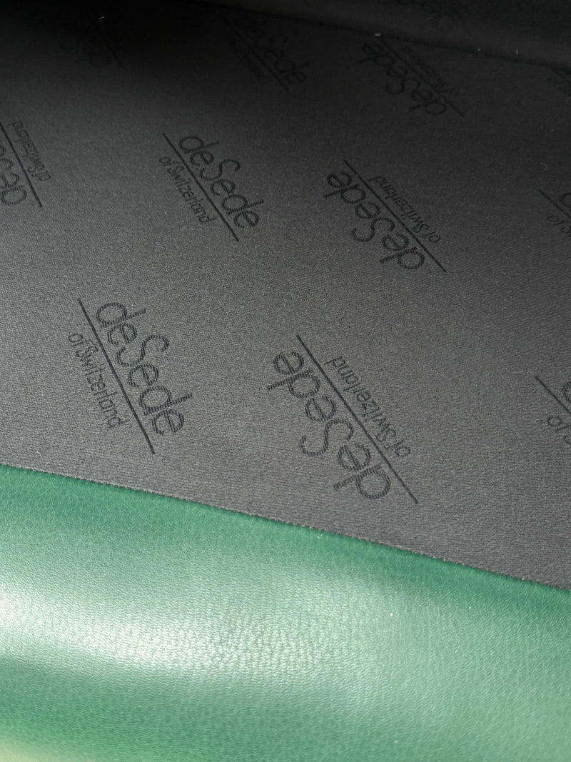 DE SEDE GREEN LEATHER ART DECO ROCKABILLY SOFA, SWITZERLAND 1970s