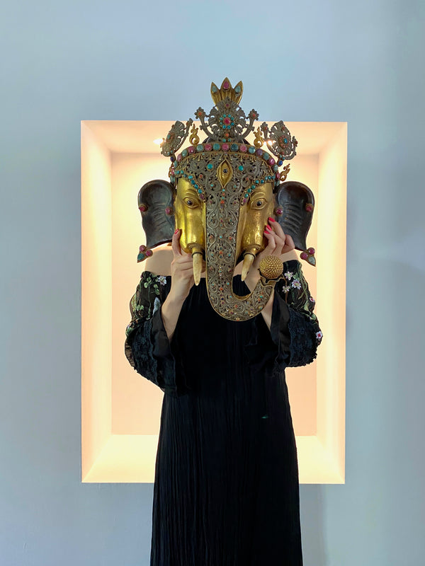 FIRE-GILDED BRONZE GANESHA HEAD WITH GEMSTONES, INDIA